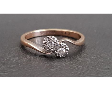 ILLUSION SET TWO STONE DIAMOND RINGin twist setting, on nine carat gold shank, ring size N-O and approximately 1.9 grams 