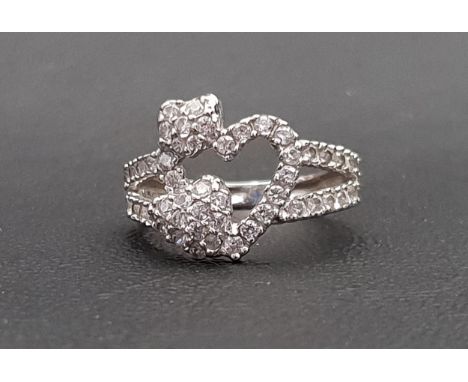 CZ SET EIGHTEEN CARAT WHITE GOLD RINGthe heart shaped setting and split shoulders, ring size L and approximately 3.1 grams 