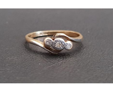 DIAMOND THREE STONE RINGon eighteen carat gold shank with twist setting, ring size L and approximately 2.3 grams 