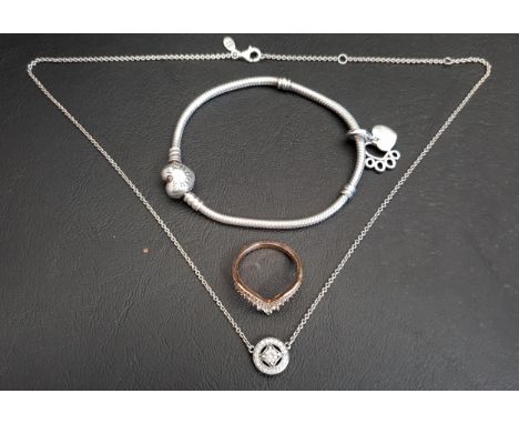 SELECTION OF PANDORA JEWELLERY comprising a heart clasp silver Moments charm bracelet with one charm; a Pandora Rose Princess