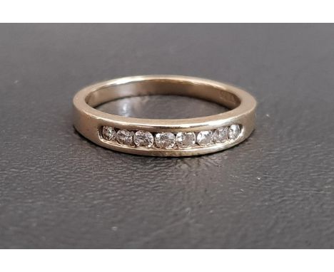 CHANNEL SET DIAMOND HALF ETERNITY RINGthe diamonds totalling approximately 0.3cts, on nine carat gold shank, ring size O and 