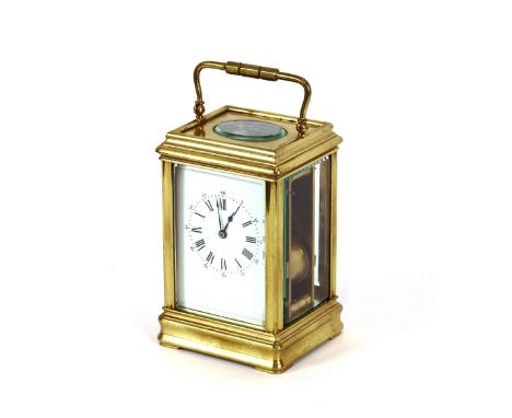 A brass cased carriage clock, striking on a gong, stamped to the backplate, LF Paris, (Louis Fernier), 19cm high including sw