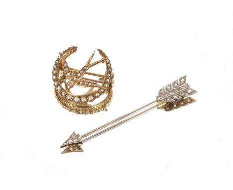 A 9 carat gold diamond and pearl set crescent shaped brooch, having swallow decoration and a diamond set arrow pin