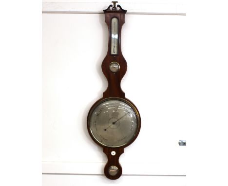 A 19th Century mahogany and boxwood strung banjo barometer/thermometer, having dry damp dial, surmounted by a scrolled arch p