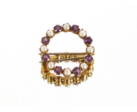 A 9 carat gold amethyst and pearl set circular brooch, 4gms total weight