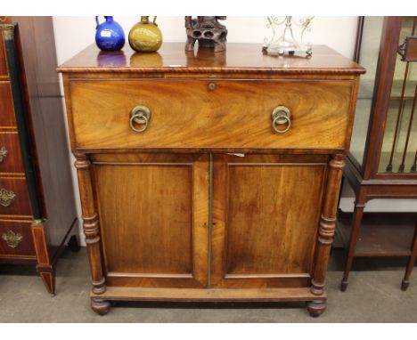 A Georgian mahogany secretaire chest, having fall front opening to reveal a fitted writing drawer, shelf and drawer below enc