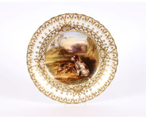 A 19th Century Copeland &amp; Garrett cabinet plate, having painted decoration of a spaniel seated by game, within gilt fancy