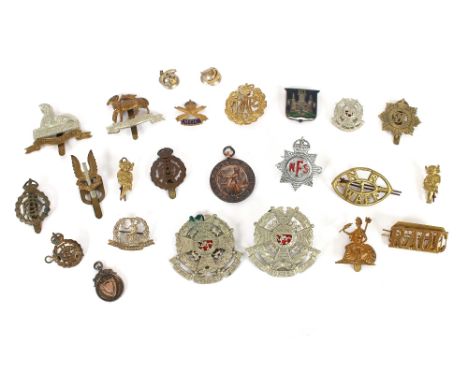 A quantity of various Army cap badges etc.