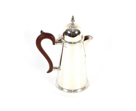 A silver coffee pot, in the early Georgian style, having domed lid surmounted by a finial, above a wooden scrolled handle, Bi