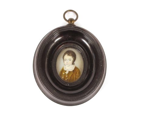 A 19th Century oval miniature portrait, depicting a young boy with lace collar, contained in an ebony frame