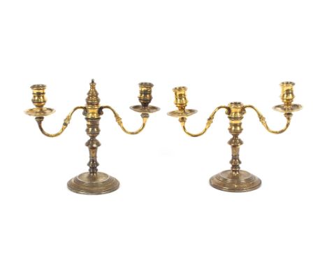 A pair of silver gilt candelabra, 22cm high, London 1963