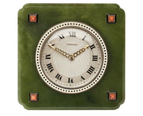 Kl. Tischuhr, Cartier, Art Déco um 1925.Messing vergoldet/Nephrit. Handaufzug. Gehäuse-Nr. 10962987. Innen Nr. 1835987. Quadr