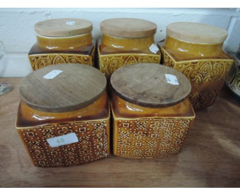 Five storage jars by Celtic Ceramics and Sadler