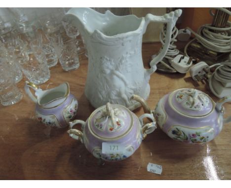A transfer printed part tea set, teapot, milk and sucre and large white jug