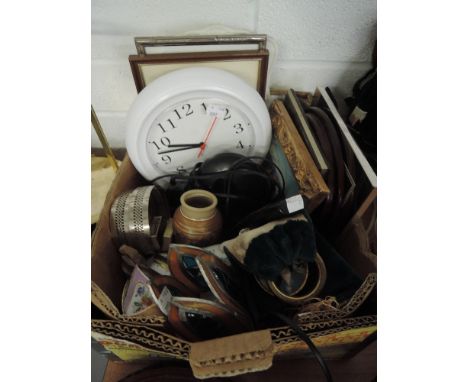 A box of various photo frames, clock and decorative ceramic items including two La Petite tin plate matchbox holders