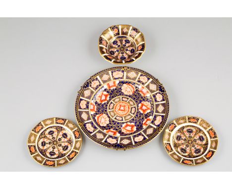 Four pieces of Crown Derby bone china including circular wall plate, Imari pattern, date coded 1898 (hairline crack), 23cm di
