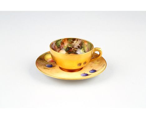 Royal Worcester coffee cup and saucer, hand painted with fruit in a naturalistic background, signed Austin, cup with gilt ext