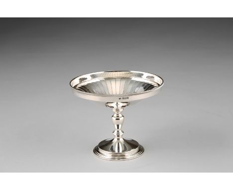 Boxed silver comport, circular bowl, fish scale design supported on a turned pedestal and a circular foot, Assay marked Birmi