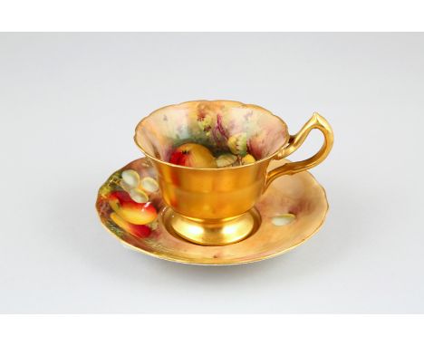 Royal Worcester scallop rimmed cup and saucer, hand painted with fruit in a naturalistic background, signed Ayrton and Mosele