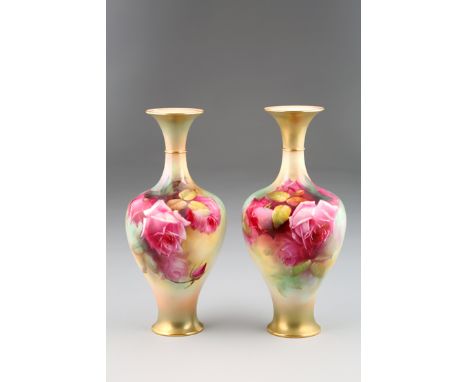 Pair Royal Worcester vases, baluster form with flared rims, hand painted with roses, signed White, date coded 1908. 30cm high
