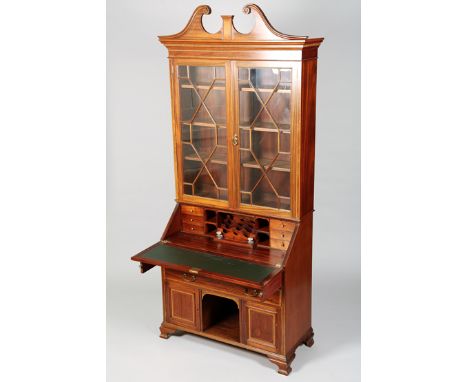 Edwardian inlaid mahogany bureau bookcase, swan neck pediment over twin glazed astragal glass doors with shelved interior, mo