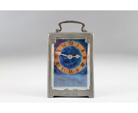 Tudric Pewter Liberty & Co. carriage clock by Archibald Knox, numbered 0721, circ 1903, with vibrant blue green enamel dial w