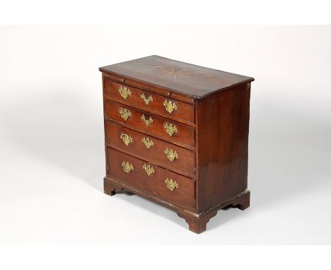 Georgian mahogany chest of small proportions, brush slide over four graduated drawers on bracket feet. 76cm long 44cm wide 76