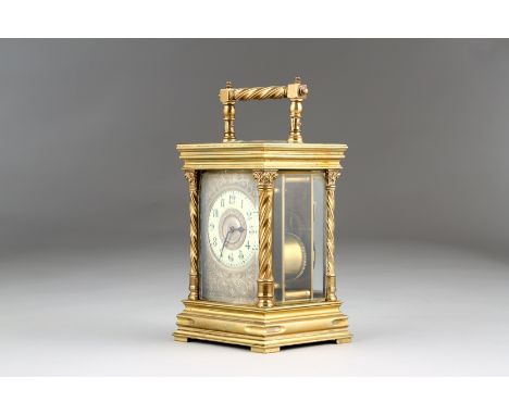 19th Century French brass striking carriage clock, silvered front plate, decorated with scrolling acanthus leaves, white enam