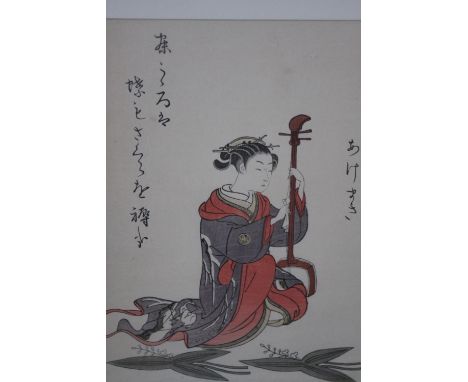 Suzuki Harunobu (1725-1770) A 19th century unframed Japanese woodblock print of a lady fixing a stringed instrument. With art