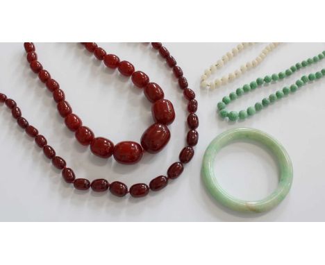 A Small Quantity of Jewellery, comprising of two bakelite bead necklaces, length 47cm and 42.5cm; a jade bead necklace, lengt