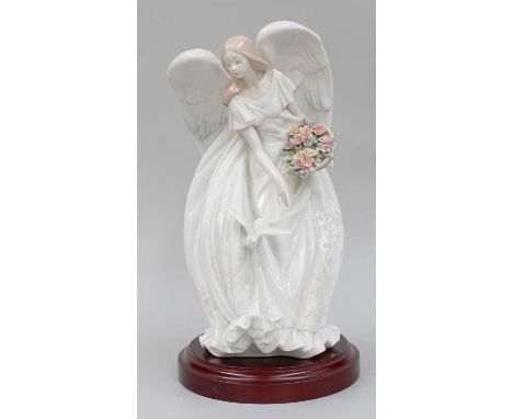 A Lladro Porcelain Figure, "Flowers of Peace" model No. 1867, by Virginia Gonzalez, signed, on wood base, with box and certif