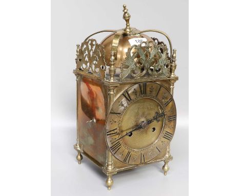 A Brass Lantern Form Striking Mantel Clock, early 20th century, twin barrel movment, striking on a top mounted bell, movement