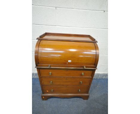 AN EDWARDIAN MAHOGANY AND INLAID BARREL FRONT BUREAU, with fitted interior, a pull out slide with navy blue leather writing s