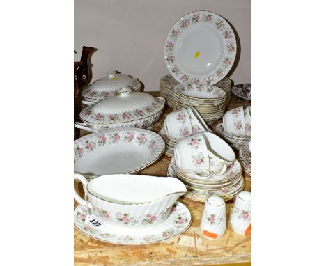 A SIXTY SIX PIECE MINTON SPRING BOUQUET DINNER SERVICE, comprising two tureens, an open vegetable dish, a sauceboat and stand