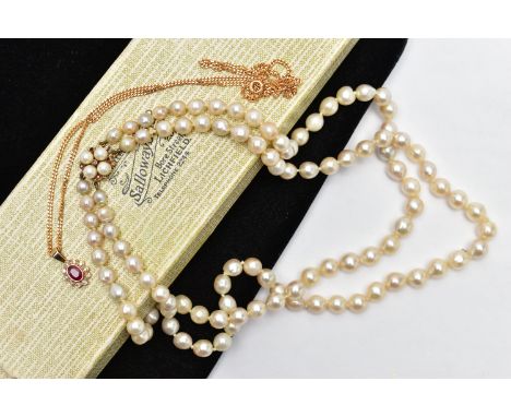 TWO NECKLACES, the first a 9ct gold oval cut ruby and brilliant cut diamond cluster surround, suspended from a flat curb link