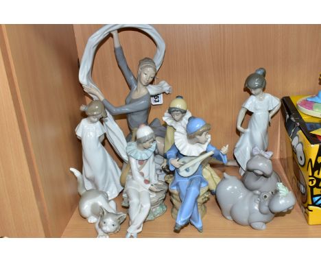 NINE NAO AND LLADRO FIGURES, comprising a Lladro Attentive Cat 5112, sculptor Salvador Debon, issued 1982-2000 (paw broken an