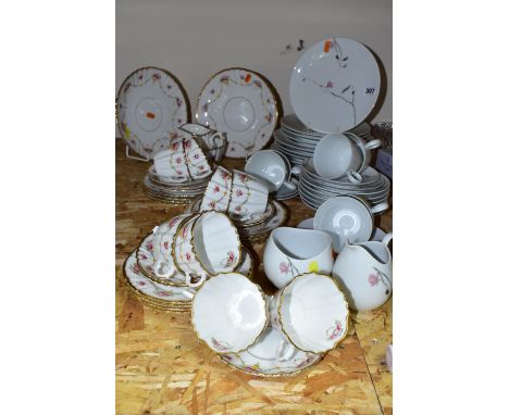 A ROSLYN BONE CHINA TEA SET TOGETHER WITH A ROSENTHAL 'RAYMOND LOWEY' TEA SET,  comprising six cups, six saucers (one chipped