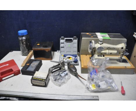 A COLLECTION OF MISCELLANEOUS to include a Lucia sewing machine, Starrett holesaw set, bag of electrical connectors, tt model