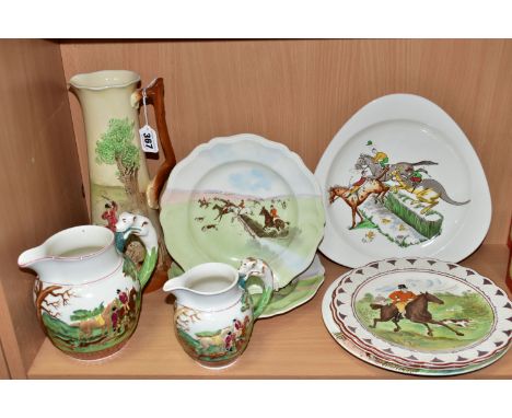 A GROUP OF HUNTING AND HORSE THEMED CERAMICS, nine pieces, comprising two Wedgwood jugs marked 'Dye Ken John Peel' heights 12