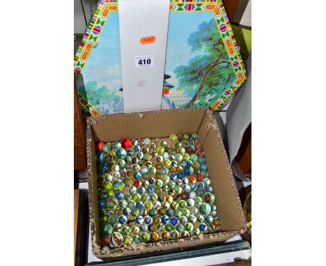 A BOXED CHINESE CHECKERS SET, together with a box of glass marbles