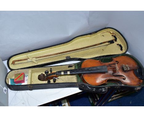 A CASED VINTAGE VIOLIN, with a two piece back, bears a printed Antonius Stradivarius label, length of body 36cm x total lengt