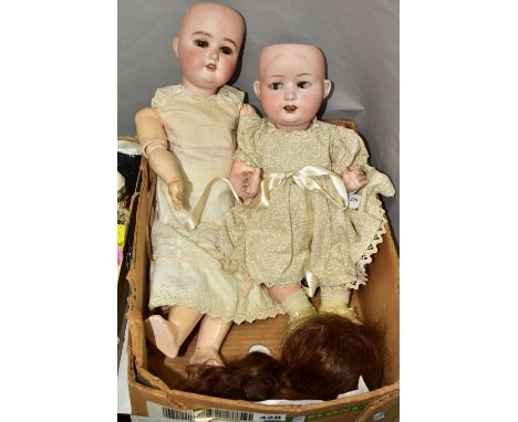 TWO ANTIQUE DOLLS, comprising a Heubach Koppelsdorf bisque headed doll, numbered to the back of the head 267.3, composite bod