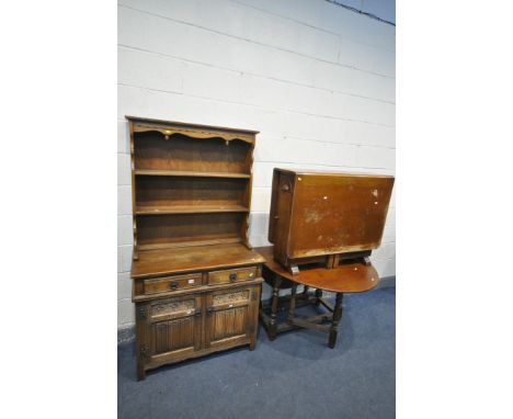 AN OLD CHARM OAK DRESSER, width 93cm x depth 44cm x height 176cm x height of base 71cm, and two oak gate leg tables (conditio
