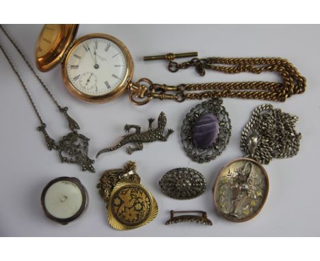 A selection of silver jewellery to include; a silver oval locket with basket detail, a marcasite set lizard brooch, a guilloc