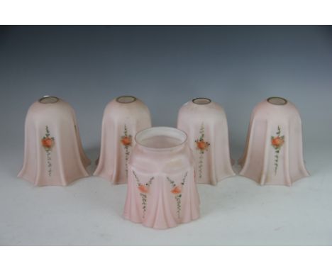 A set of four opaque glass light shades, painted with roses, 14cm, and one similar shade (5)