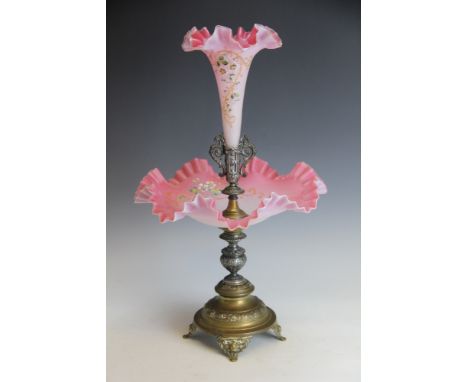 A 19th century WMF epergne / centre piece, the central arabesque cast column supporting a pink and opaque glass frilled dish 