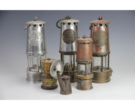 Three Protector Lamp and Lighting Co miners Davy lamps, including a Type SL and a Type 6 HMI, with two smaller lamps (5)