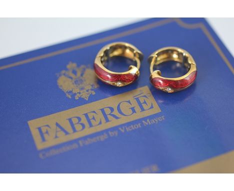 A pair of Victor Mayer for Faberge earrings, the 18ct yellow gold hoop earrings each with red enamel panels and diamond set, 