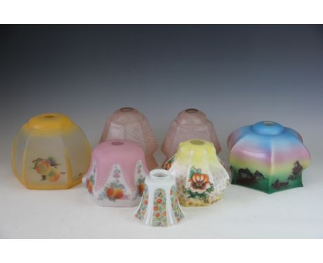 A pair of 1930's pink and clear glass spiral decorated glass light shades, 15.5cm, with a printed multi-coloured glass shade 