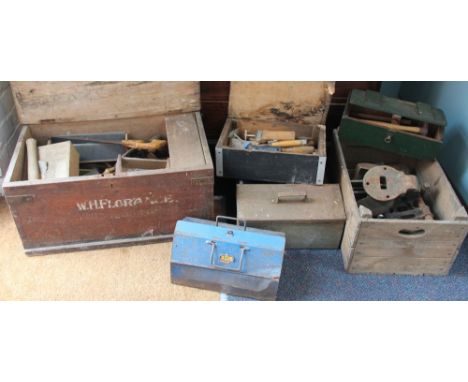 A quantity of tools, to include a standing vice, hammers etc in three trunks, a metal tin and a box (Qty)